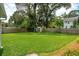 Expansive backyard featuring a well-manicured lawn and storage shed, perfect for outdoor activities and relaxation at 43 Heathwood Dr, Charleston, SC 29407