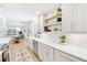 Bright kitchen featuring white cabinets, open shelving, and stainless steel appliances at 43 Heathwood Dr, Charleston, SC 29407