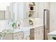 Bright kitchen featuring white cabinets, quartz countertops, a farmhouse sink, and stainless steel appliances at 43 Heathwood Dr, Charleston, SC 29407