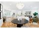 Open concept living and dining area with modern decor and natural light at 43 Heathwood Dr, Charleston, SC 29407