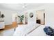 Spacious main bedroom boasts wood floors, ample light, and ensuite bathroom at 43 Heathwood Dr, Charleston, SC 29407
