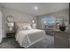 Calm bedroom featuring a queen-sized bed, two side tables with lamps, and natural lighting at 430 Caledon Court Ct, Johns Island, SC 29455