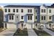 Charming townhome featuring modern architectural details and attached garage at 430 Caledon Court Ct, Johns Island, SC 29455
