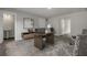 Spacious office with a wooden desk, modern decor, and access to a convenient half bathroom at 469 Caledon Ct, Johns Island, SC 29455