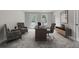 Spacious home office with comfortable seating, desk, and ample natural light at 503 Caledon Court Ct, Johns Island, SC 29455