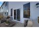 Outdoor patio featuring comfortable seating and sliding glass doors at 503 Caledon Court Ct, Johns Island, SC 29455