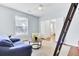 Bright living room with hardwood floors, comfortable seating, and plenty of natural light at 5406 Dwight Dr, North Charleston, SC 29420