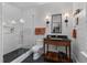 Modern bathroom with white subway tile, a glass enclosed shower, and a stylish vanity at 627 Barbados Dr, Charleston, SC 29492