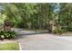 Elegant gated entrance with brick columns, ensuring privacy and security for the community at 627 Barbados Dr, Charleston, SC 29492