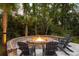 Inviting backyard fire pit with cozy seating, perfect for entertaining and enjoying outdoor evenings at 627 Barbados Dr, Charleston, SC 29492