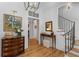 Charming foyer with hardwood floors, a staircase, and stylish furnishings at 627 Barbados Dr, Charleston, SC 29492