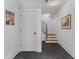 Hallway with Herringbone tile floors that lead to the staircase at 627 Barbados Dr, Charleston, SC 29492