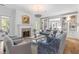 Bright, spacious living room featuring a fireplace, built-in shelving, and elegant decor at 627 Barbados Dr, Charleston, SC 29492