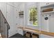Functional mudroom with built-in bench, storage, and natural light at 627 Barbados Dr, Charleston, SC 29492