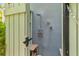 Inviting outdoor shower featuring a wooden bench and privacy enclosure at 627 Barbados Dr, Charleston, SC 29492