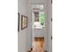 Cozy pantry with ample cabinet space, natural light, and hardwood floors adds a touch of rustic elegance at 627 Barbados Dr, Charleston, SC 29492