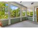 Beautiful screened in porch with views of nature at 627 Barbados Dr, Charleston, SC 29492