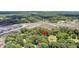 Overhead view exhibiting the residence in a vibrant, wooded community near distinctive marsh tributaries at 7274 Commodore Rd, Hollywood, SC 29449