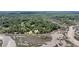 Expansive aerial view of home nestled among lush trees near the tidal rivers at 7274 Commodore Rd, Hollywood, SC 29449