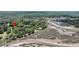 Gorgeous aerial view of home nestled among lush trees near the river at 7274 Commodore Rd, Hollywood, SC 29449