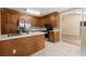 Kitchen featuring stainless steel appliances, quartz countertops, and hardwood cabinets at 8116 Long Shadow Ln, North Charleston, SC 29406