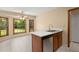 Cozy kitchen breakfast nook combo, featuring tile floors, large windows, and stainless dishwasher at 8116 Long Shadow Ln, North Charleston, SC 29406