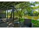 This backyard features a lake, spiral staircase and greenery all around at 8483 Yadkin Cir # D, North Charleston, SC 29406