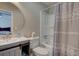 This cozy bathroom features a vanity, toilet, shower and bathtub with shower curtain at 8483 Yadkin Cir # D, North Charleston, SC 29406
