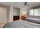 Bright bedroom with two twin beds, closet, and a window, offering a cozy and organized space at 8483 Yadkin Cir # D, North Charleston, SC 29406