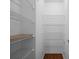 Walk-in closet with wood floors and wire shelving for optimal storage at 9175 Spring Branch Ct, North Charleston, SC 29406