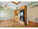 Kitchenette with a double oven and wooden cabinets, with a hardwood floor, with room for a small table at 9175 Spring Branch Ct, North Charleston, SC 29406