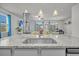 Granite countertops accent this eat-in kitchen with pendant lighting and stainless steel appliances at 9700 Flooded Field Dr, Ladson, SC 29456