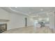 Bright and airy living space with a fireplace, recessed lighting, and an adjacent modern kitchen at 0 Peirce Rd, Ridgeville, SC 29472