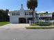 A home with elevated construction, covered parking, and a deck at 1001 Palmetto Blvd, Edisto Island, SC 29438