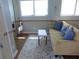 Cozy living room with a couch, coffee table, and a swan statue at 1001 Palmetto Blvd, Edisto Island, SC 29438