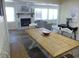 Open-concept living space with fireplace and inviting seating areas at 1001 Palmetto Blvd, Edisto Island, SC 29438