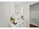 Bright bathroom featuring a modern vanity with a lighted mirror and stylish decor accents at 1043 Dominion Dr, Hanahan, SC 29410
