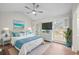 Bright bedroom features shuttered windows, vaulted ceilings and coastal decor at 1043 Dominion Dr, Hanahan, SC 29410