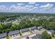 Birds eye view of a neighborhood featuring cozy townhomes nestled among the trees at 1064 Lexi Ct, Ladson, SC 29456