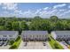 Aerial view of townhome community showcasing ample parking and varied exteriors at 1064 Lexi Ct, Ladson, SC 29456