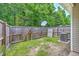 Fenced backyard featuring a satellite dish and an air conditioning unit at 1064 Lexi Ct, Ladson, SC 29456