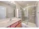 Bathroom featuring a modern vanity, mirror, and a separate shower with stylish tile surround at 1064 Lexi Ct, Ladson, SC 29456