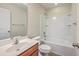 Bright bathroom featuring a vanity with a sink, mirror, and a bathtub with a white surround at 1064 Lexi Ct, Ladson, SC 29456