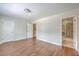 Bright and airy bedroom featuring wood floors and an ensuite bathroom for added convenience at 1064 Lexi Ct, Ladson, SC 29456