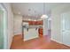 A kitchen with stainless steel appliances, lots of cabinets, and wood-look floors at 1064 Lexi Ct, Ladson, SC 29456