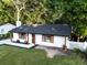 Overhead shot of updated home; new roof, white paint, beautiful yard and landscape and wooden shutters at 1129 Dickson Ave, Hanahan, SC 29410