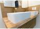Close up of a bathroom featuring a double sink vanity with gold fixtures at 1129 Dickson Ave, Hanahan, SC 29410