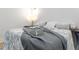 Close up of bedroom decor with comfortable bed and striped throw pillows at 1129 Dickson Ave, Hanahan, SC 29410