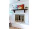 Elegant fireplace with decorative mantel, detailed screen, and stylish accents at 1129 Dickson Ave, Hanahan, SC 29410