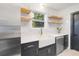 Bright kitchen with modern sink, floating shelves, and new appliances at 1129 Dickson Ave, Hanahan, SC 29410